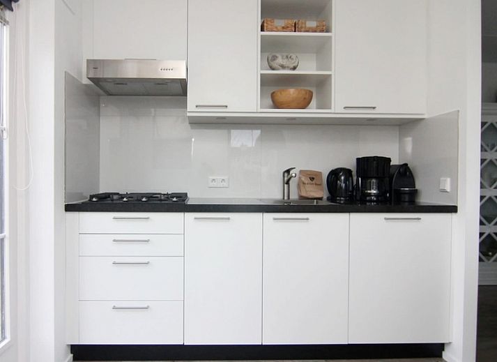 Vacation home D 692 in De Cocksdorp, Texel offers charming accommodation with a sunny terrace and green garden, ideal for a relaxing vacation.