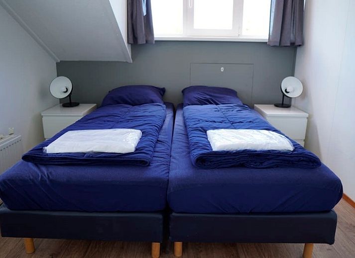 Vacation home D 692 in De Cocksdorp, Texel offers charming accommodation with a sunny terrace and green garden, ideal for a relaxing vacation.