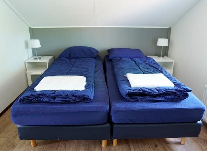 Vacation home D 692 in De Cocksdorp, Texel offers charming accommodation with a sunny terrace and green garden, ideal for a relaxing vacation.