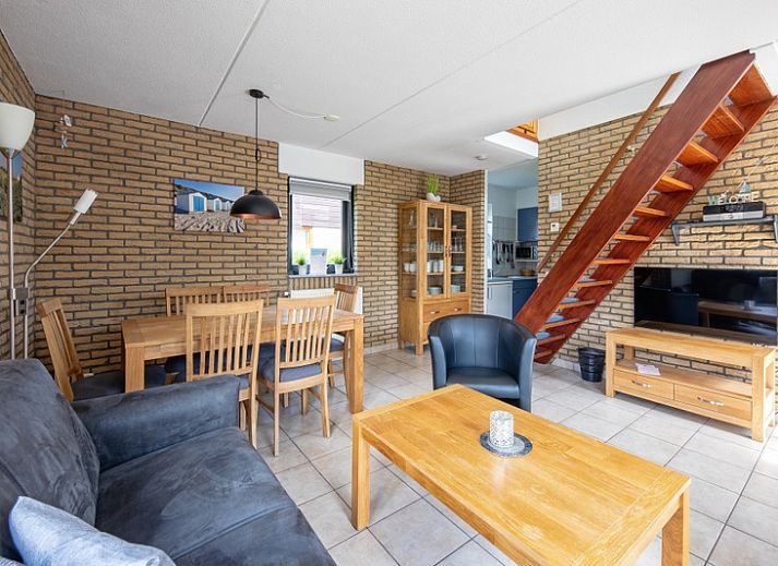 Vacation home A 309 in De Cocksdorp, Texel, offers a charming outdoor space with green garden and modern architecture on the Wadden Islands.