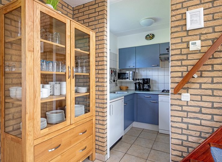 Vacation home A 309 in De Cocksdorp, Texel, offers a charming outdoor space with green garden and modern architecture on the Wadden Islands.