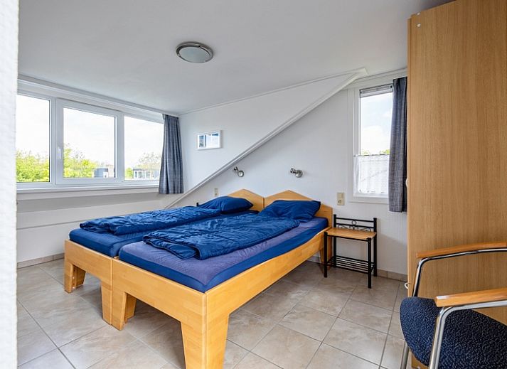 Enjoy the sunny patio of Holiday home A 309 in De Cocksdorp, Texel. Ideal for relaxation on the Wadden Islands.