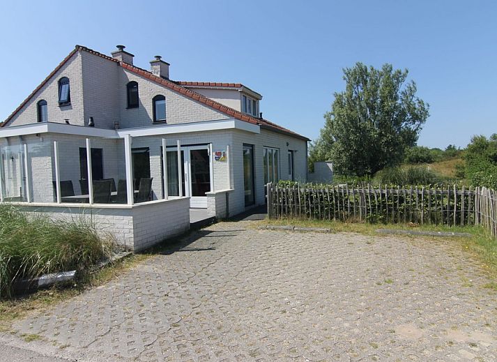 Vakantiehuis D 477 in De Cocksdorp, Texel met ruime veranda en omringd door groene natuur op de Waddeneilanden.