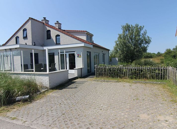 Vakantiehuis D 477 in De Cocksdorp, Texel met ruime veranda en omringd door groene natuur op de Waddeneilanden.
