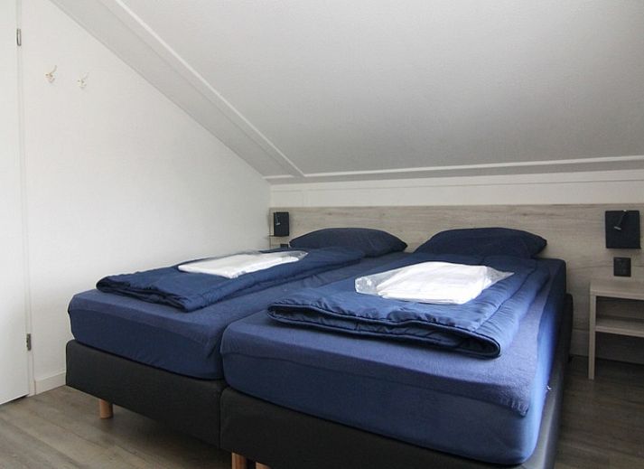 Geniet van de ruime tuin bij Vakantiehuis D 477 in De Cocksdorp, Texel. Ontspan in de natuur van de Waddeneilanden.