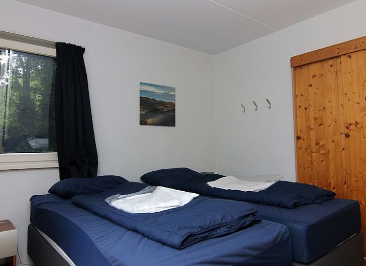 Vakantiehuis A 023 in De Cocksdorp, Texel, biedt een serene verblijfservaring te midden van groene natuur en rustige omgeving.