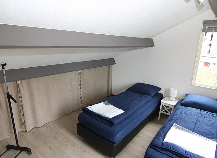 Vakantiehuis C 137 in De Cocksdorp, Texel, biedt een moderne uitstraling met een prachtig uitzicht op de groene omgeving van de Waddeneilanden.