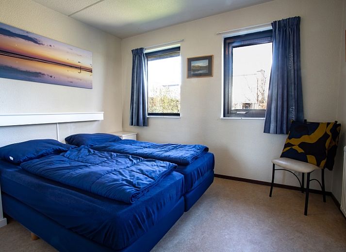 Vakantiehuis B 195 in De Cocksdorp, Texel biedt een zonnige tuin en terras voor een ontspannen verblijf op de Waddeneilanden.