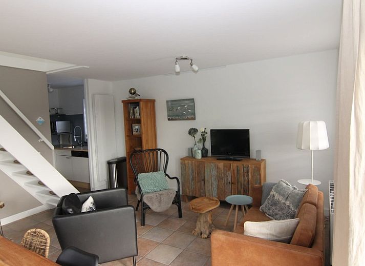 Geniet van de zonnige tuin en terras van Vakantiehuis B 127 in De Cocksdorp, Texel, perfect voor ontspanning op de Waddeneilanden.