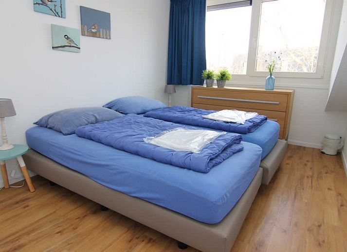 Vakantiehuis B 127 in De Cocksdorp, Texel biedt een charmant verblijf met moderne architectuur, ideaal voor een ontspannen vakantie op de Waddeneilanden.