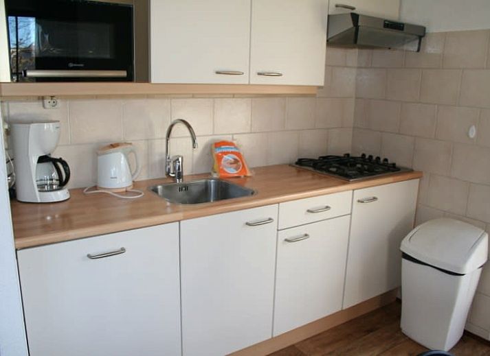 Vakantiehuis D 531 in De Cocksdorp, Texel, biedt een charmante buitenruimte met terras en groene omgeving op de Waddeneilanden.