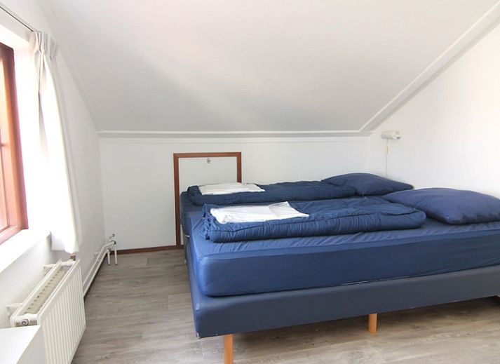 Vakantiehuis D 531 in De Cocksdorp, Texel, biedt een charmante buitenruimte met terras en groene omgeving op de Waddeneilanden.