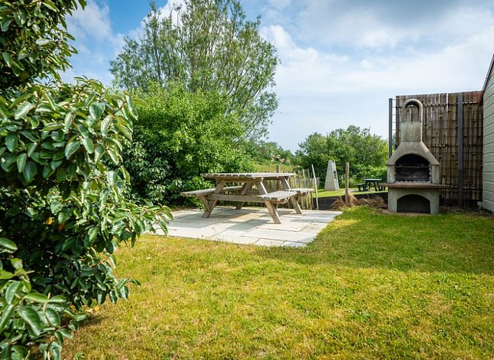 Vakantiehuis D 473 in De Cocksdorp, Texel, met zonnig terras en omringd door natuur op de Waddeneilanden.