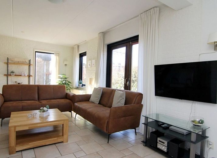 Vakantiehuis B 261 in De Cocksdorp, Texel, biedt een charmant verblijf met een groene tuin en gezellige buitenruimte op de Waddeneilanden.