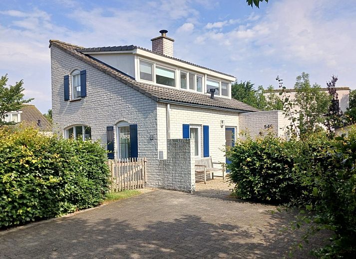 Vacation home F 549 in De Cocksdorp, Texel offers a charming exterior with sunny terrace, ideal for a relaxing stay on the Wadden Islands.