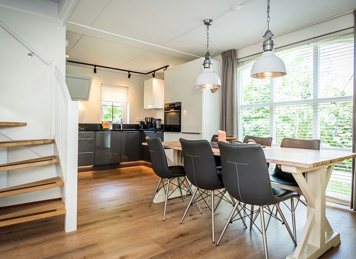 Vacation home F 549 in De Cocksdorp, Texel, offers a charming exterior with spacious garden and terrace, ideal for a relaxing stay on the Wadden Islands.