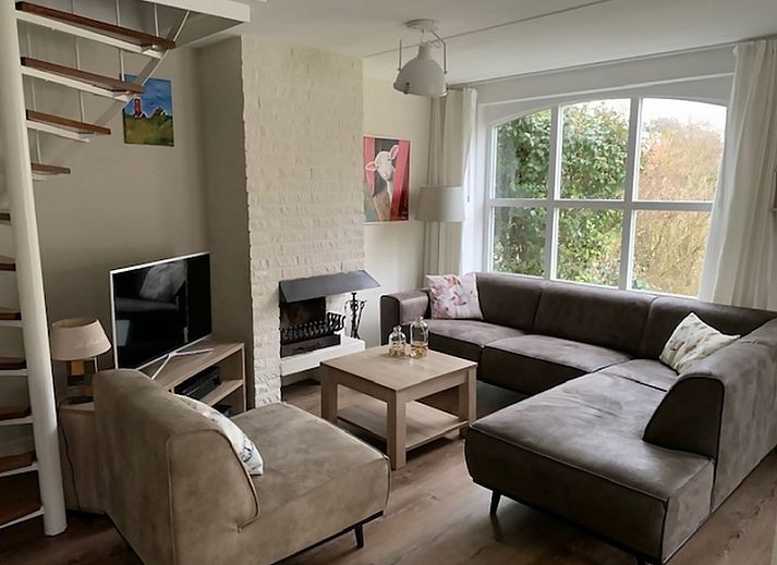 Geniet van de zonnige tuin van Vakantiehuis D 585, een charmant vakantiehuis in De Cocksdorp op Texel, Waddeneilanden.