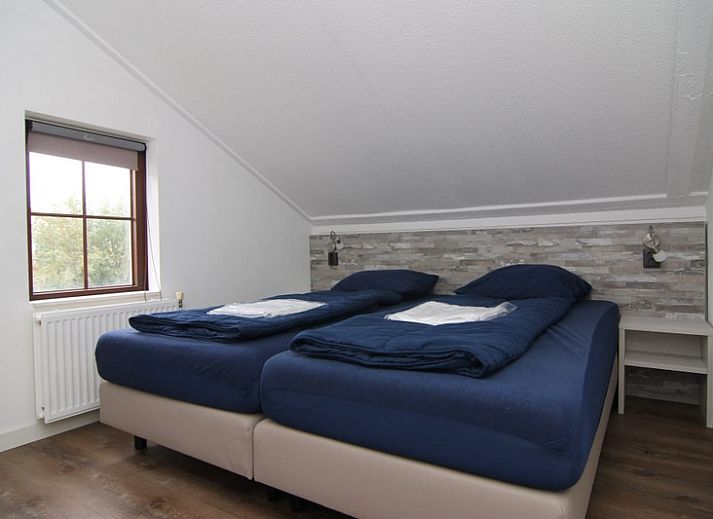 Vakantiehuis D 585 in De Cocksdorp, Texel met ruime tuin en terras, ideaal voor ontspanning op de Waddeneilanden.