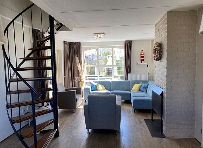 Vakantiehuis E 417 in De Cocksdorp, Texel biedt een charmante buitenkant met ruime tuin en rustieke omgeving op de Waddeneilanden.