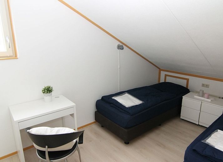 Vakantiehuis D 728 in De Cocksdorp op Texel biedt een charmant terras en serene omgeving voor een ontspannen verblijf op de Waddeneilanden.