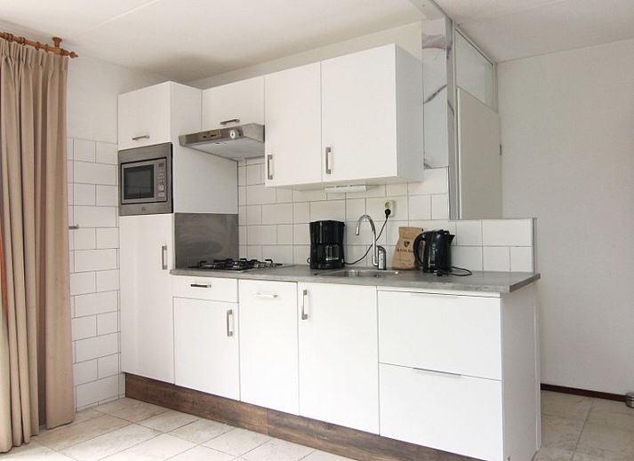 Vakantiehuis D 485 in De Cocksdorp, Texel, biedt een charmante buitenkant met ruime tuin en zonnig terras op de Waddeneilanden.