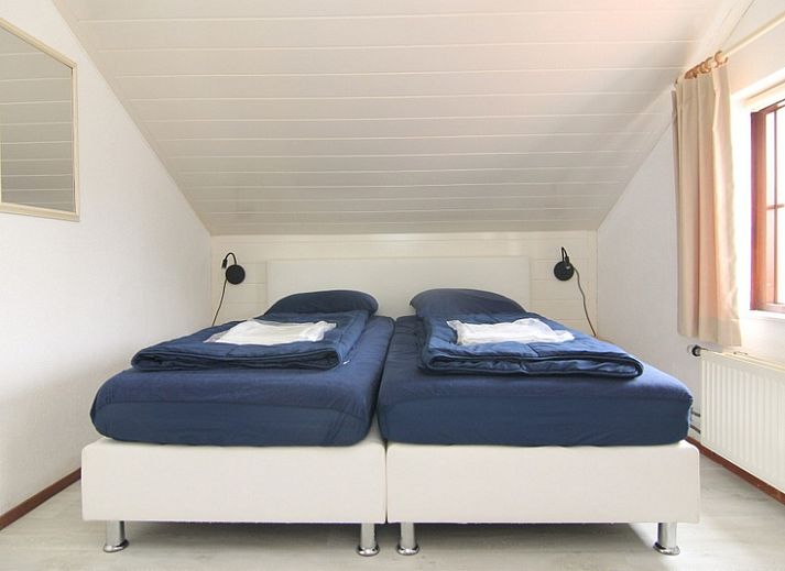 Vakantiehuis D 485 in De Cocksdorp, Texel, biedt een charmante buitenkant met ruime tuin en zonnig terras op de Waddeneilanden.