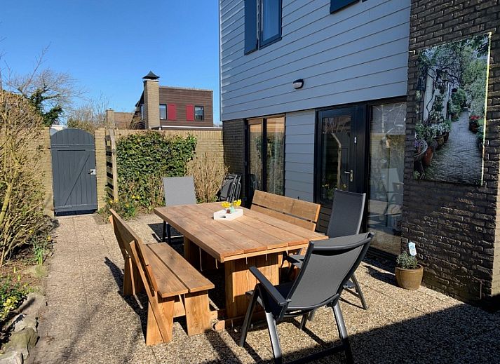 Vakantiehuis A 143 in De Cocksdorp op Texel biedt een moderne vakantiewoning met ruime tuin en uitzicht op de natuur van de Waddeneilanden.