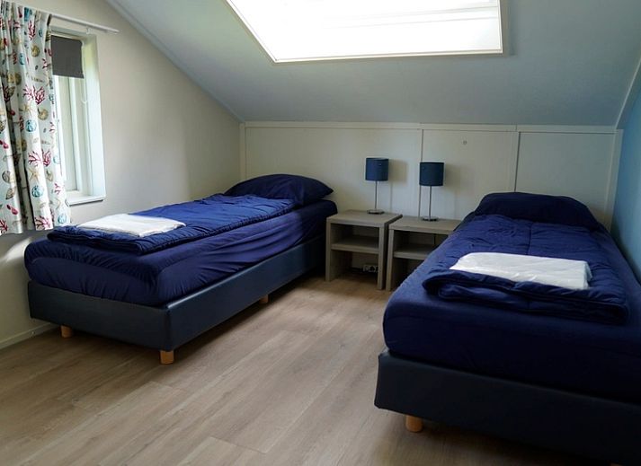 Vakantiehuis D 770 in De Cocksdorp, Texel met zonnig terras en groene tuin, perfect voor een ontspannen verblijf op de Waddeneilanden.