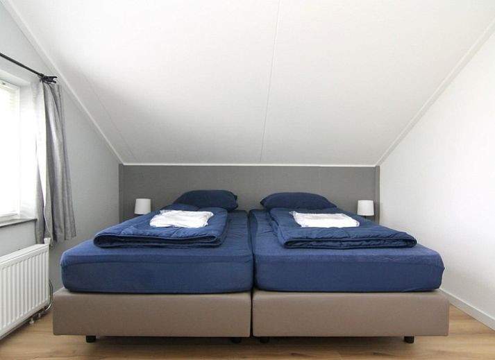 Geniet van de groene tuin bij Vakantiehuis D 610 in De Cocksdorp, Texel, met veel privacy en natuurrijke omgeving op de Waddeneilanden.