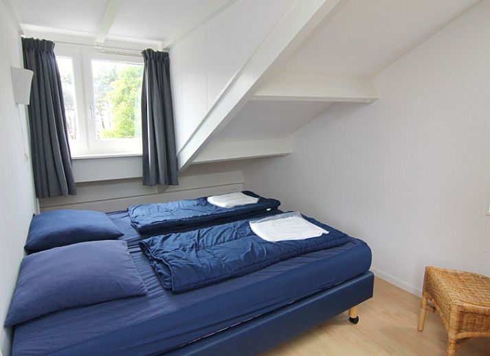 Vakantiehuis A 351 in De Cocksdorp, Texel biedt een modern exterieur met ruime tuin, ideaal voor een ontspannen verblijf op de Waddeneilanden.