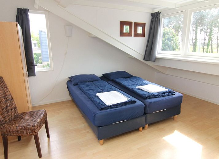 Vakantiehuis A 351 in De Cocksdorp, Texel biedt een ruime tuin met terras, ideaal voor ontspanning in de natuur van de Waddeneilanden.