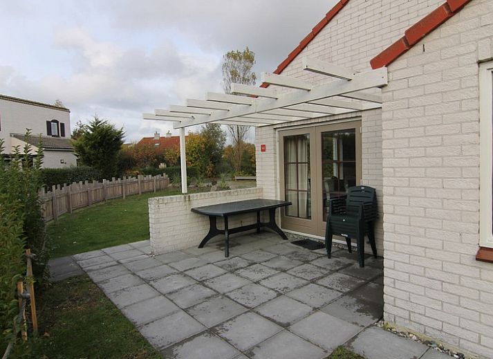 Vakantiehuis D 441 in De Cocksdorp, Texel biedt een charmant verblijf met een zonnig terras en omgeven door groene natuur op de Waddeneilanden.
