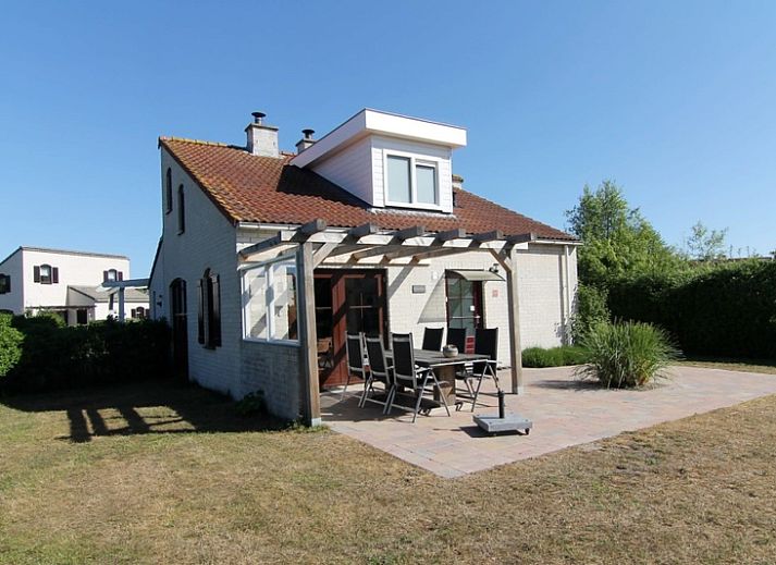 Ferienhaus D 401 in De Cocksdorp, Texel mit sonniger Terrasse und gruener Umgebung, ideal fuer einen erholsamen Aufenthalt auf den Watteninseln.