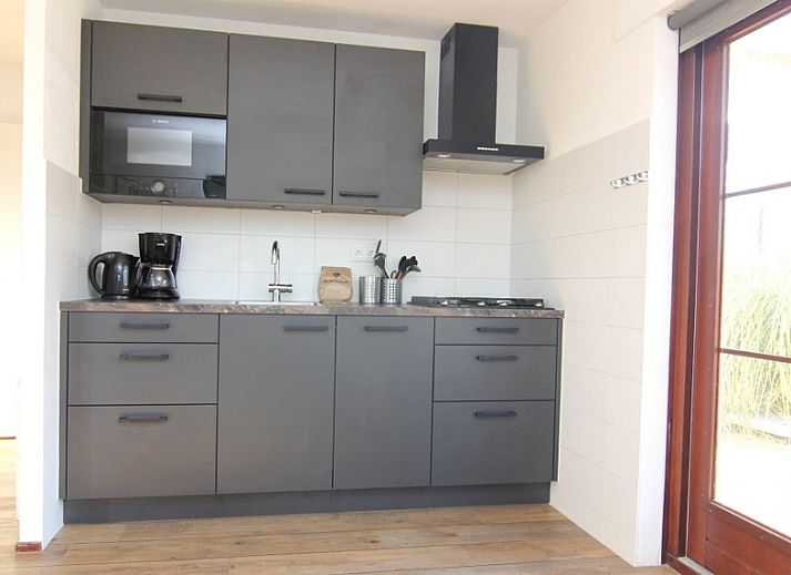 Ferienhaus D 401 in De Cocksdorp, Texel mit Sonnenterrasse inmitten der Natur auf den Watteninseln.