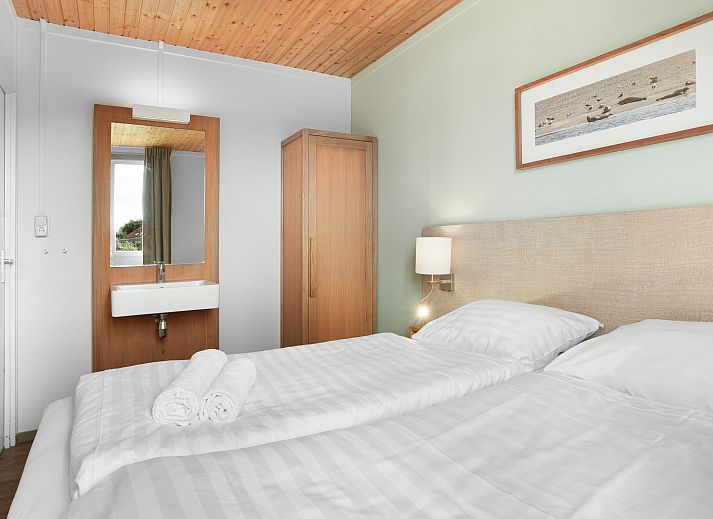 Sluftervallei 6-persoons bungalow 6C in De Cocksdorp Texel met zonnig terras en omringd door duinen.