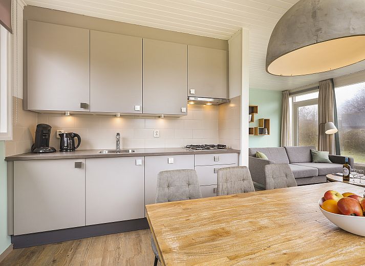 Knusse zithoek in Sluftervallei 6-persoons bungalow 6C, De Cocksdorp, Texel, ideaal voor ontspanning.