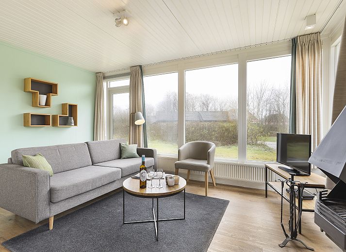 Knusse zithoek in Sluftervallei 6-persoons bungalow 6C, De Cocksdorp, Texel, ideaal voor ontspanning.