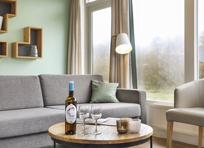 Knusse zithoek in Sluftervallei 6-persoons bungalow 6C, De Cocksdorp, Texel, ideaal voor ontspanning.