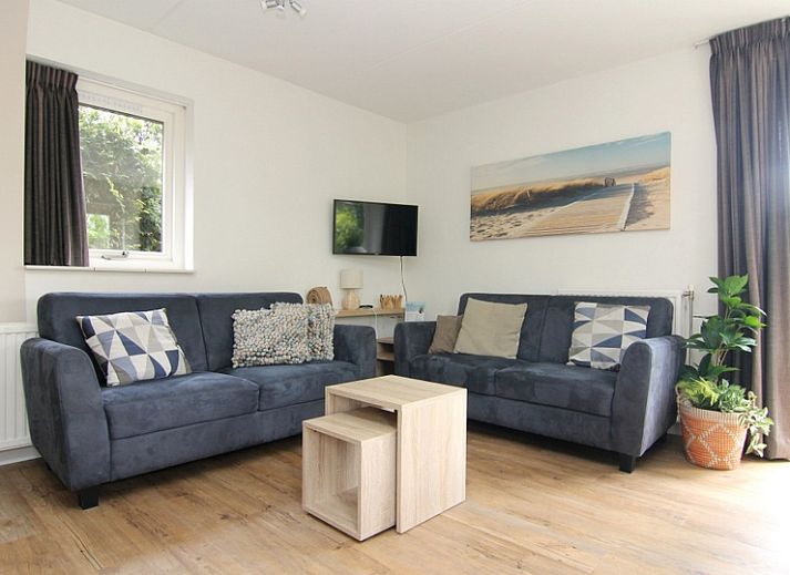 Vakantiehuis A 287 in De Cocksdorp, Texel biedt een charmante buitenkant omringd door natuur, ideaal voor een ontspannen verblijf op de Waddeneilanden.