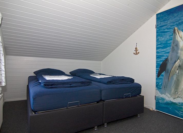 Das Ferienhaus D 439 in De Cocksdorp auf Texel besticht durch einen einladenden Eingangsbereich, moderne Architektur und einen grossen Parkplatz.