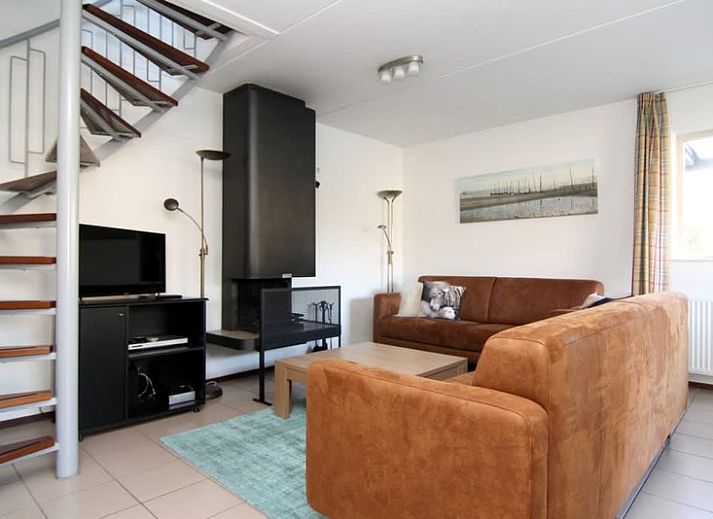 Ferienhaus D 760 in De Cocksdorp, Texel, mit sonniger Terrasse und gruenem Garten, ideal fuer einen entspannten Aufenthalt auf den Watteninseln.