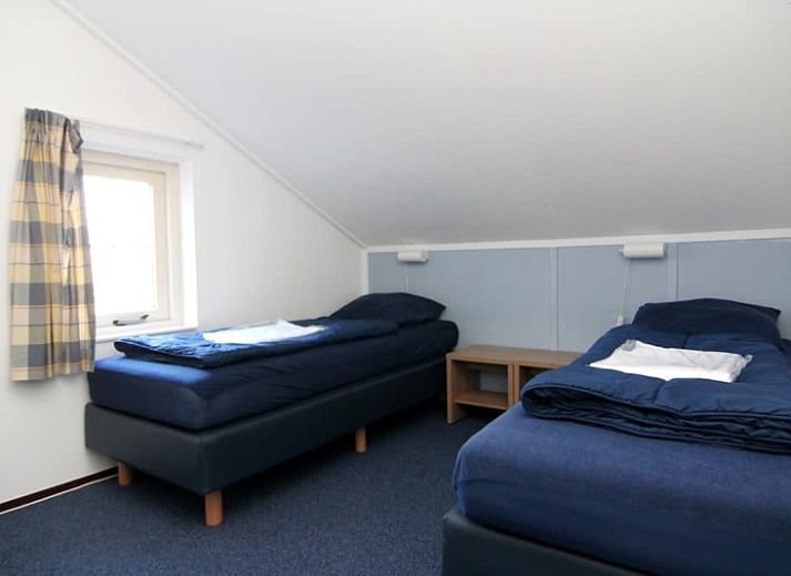 Das Ferienhaus D 760 in De Cocksdorp, Texel, bietet eine charmante Terrasse mit Gartenblick, ideal zum Entspannen auf den Watteninseln.