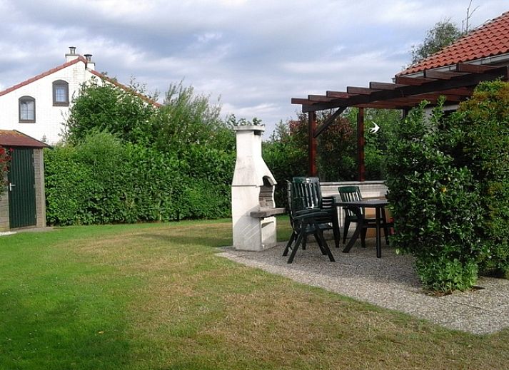 Vakantiehuis D 521 in De Cocksdorp, Texel biedt een charmante buitenruimte met terras en groene tuin op de Waddeneilanden.