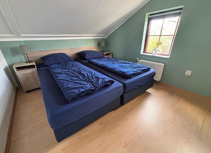 Vakantiehuis D 521 in De Cocksdorp, Texel biedt een serene omgeving met een ruime tuin en terras, ideaal voor ontspanning op de Waddeneilanden.