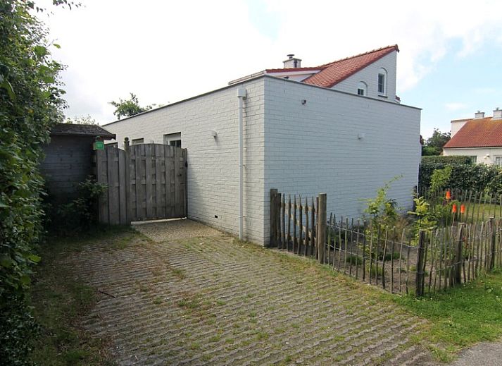 Ferienhaus D 671 in De Cocksdorp, Texel mit Sonnenterrasse und gruenem Garten, ideal fuer Entspannung auf den Watteninseln.
