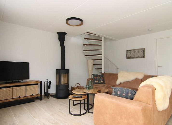 Ferienhaus D 671 in De Cocksdorp, Texel mit Sonnenterrasse und gruenem Garten, ideal fuer Entspannung auf den Watteninseln.