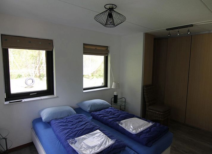 Vakantiehuis B 015 in De Cocksdorp, Texel: charmant verblijf met moderne architectuur en ruim terras, ideaal voor ontspannen vakantie op de Waddeneilanden.