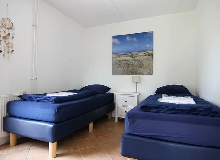 Vakantiehuis D 662 in De Cocksdorp, Texel, biedt een charmant verblijf met een zonnig terras en traditionele architectuur op de Waddeneilanden.