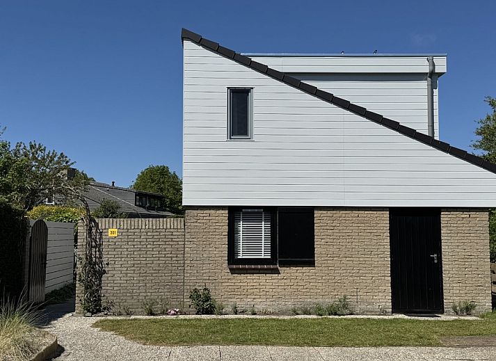 Vacation home A 301 in De Cocksdorp, Texel offers a charming exterior with modern architecture on the Wadden Islands.