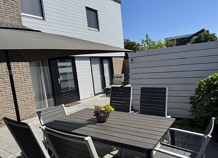 Vacation home A 301 in De Cocksdorp, Texel offers a charming exterior with modern architecture on the Wadden Islands.